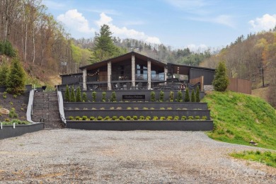 Welcome to 423 Grouse Thicket Ln in Mars Hill, NC - a on Wolf Laurel Country Club in North Carolina - for sale on GolfHomes.com, golf home, golf lot