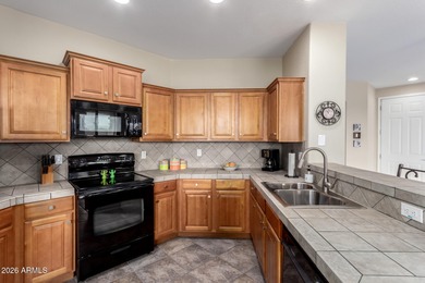 Beautiful gated home with a stunning backyard offering panoramic on Palm Valley Golf Club  in Arizona - for sale on GolfHomes.com, golf home, golf lot