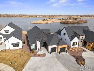 Impeccable ranch-style contemporary residence situated on an on Pelican Lakes Golf and Country Club in Colorado - for sale on GolfHomes.com, golf home, golf lot