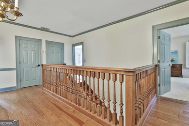 ONE OF GRIFFIN'S FINEST HOMES IS THIS BEAUTIFUL WILLIAMSBURG on The Club at Shoal Creek Golf Course in Georgia - for sale on GolfHomes.com, golf home, golf lot