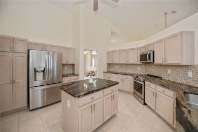 PANORAMIC LAKE VIEWS within the 24/7 secure gated and on Riverwood Golf Club in Florida - for sale on GolfHomes.com, golf home, golf lot