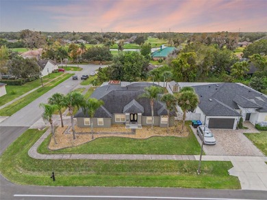 Welcome to your beautifully updated pool and hot tub home in the on Wedgefield Golf Club in Florida - for sale on GolfHomes.com, golf home, golf lot