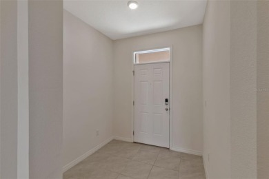 Welcome to this nearly brand-new waterfront townhouse located in on Ridgewood Lakes Golf and Country Club in Florida - for sale on GolfHomes.com, golf home, golf lot