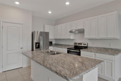 Welcome to this nearly brand-new waterfront townhouse located in on Ridgewood Lakes Golf and Country Club in Florida - for sale on GolfHomes.com, golf home, golf lot