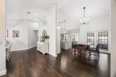 Welcome to your beautifully updated pool and hot tub home in the on Wedgefield Golf Club in Florida - for sale on GolfHomes.com, golf home, golf lot