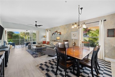 This nicely updated second-floor end-unit coach home, located in on Windstar on Naples Bay in Florida - for sale on GolfHomes.com, golf home, golf lot