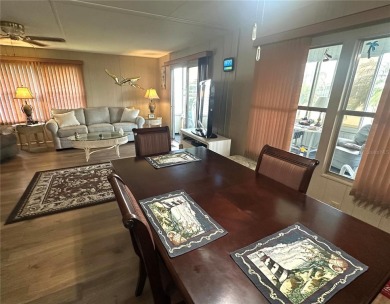 Enjoy a home and your own golf cart in the active 55+ community on Riverwood Golf Club in Florida - for sale on GolfHomes.com, golf home, golf lot