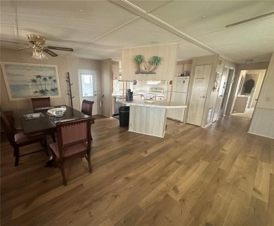 Enjoy a home and your own golf cart in the active 55+ community on Riverwood Golf Club in Florida - for sale on GolfHomes.com, golf home, golf lot