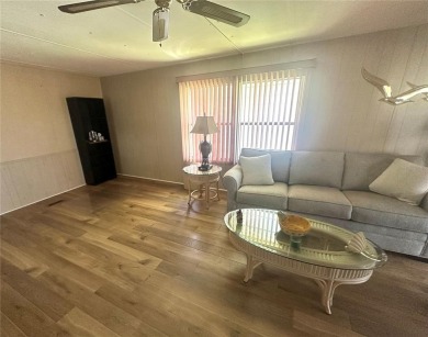 Enjoy a home and your own golf cart in the active 55+ community on Riverwood Golf Club in Florida - for sale on GolfHomes.com, golf home, golf lot