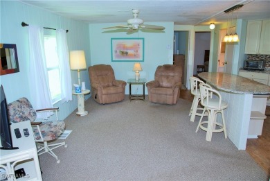 Light, airy, and inviting, this beautifully updated home is on Six Lakes Country Club in Florida - for sale on GolfHomes.com, golf home, golf lot
