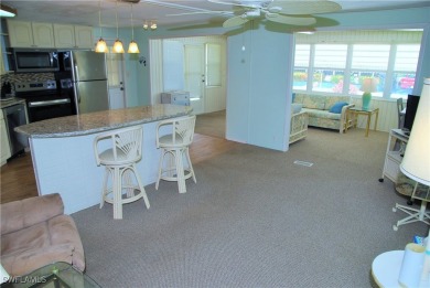 Light, airy, and inviting, this beautifully updated home is on Six Lakes Country Club in Florida - for sale on GolfHomes.com, golf home, golf lot