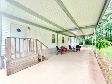 This spacious 4-bedroom, 2.5-bath home sits on a large corner on Pendleton Harbor in Texas - for sale on GolfHomes.com, golf home, golf lot