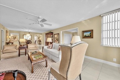 Spacious and updated 3BR/2.5BA *F* model with tile & laminate on  in Florida - for sale on GolfHomes.com, golf home, golf lot