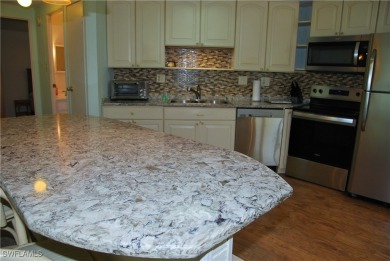 Light, airy, and inviting, this beautifully updated home is on Six Lakes Country Club in Florida - for sale on GolfHomes.com, golf home, golf lot