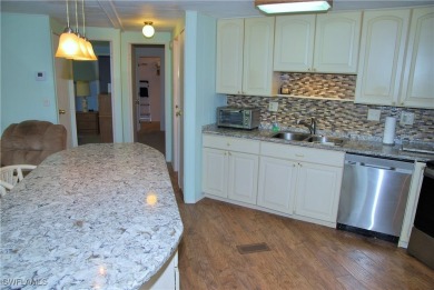 Light, airy, and inviting, this beautifully updated home is on Six Lakes Country Club in Florida - for sale on GolfHomes.com, golf home, golf lot