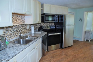 Light, airy, and inviting, this beautifully updated home is on Six Lakes Country Club in Florida - for sale on GolfHomes.com, golf home, golf lot