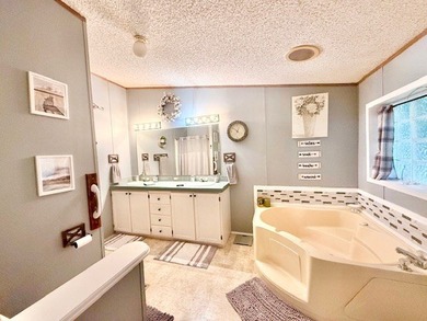 This spacious 4-bedroom, 2.5-bath home sits on a large corner on Pendleton Harbor in Texas - for sale on GolfHomes.com, golf home, golf lot