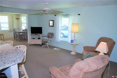 Light, airy, and inviting, this beautifully updated home is on Six Lakes Country Club in Florida - for sale on GolfHomes.com, golf home, golf lot