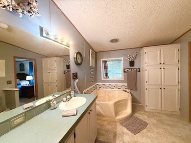 This spacious 4-bedroom, 2.5-bath home sits on a large corner on Pendleton Harbor in Texas - for sale on GolfHomes.com, golf home, golf lot