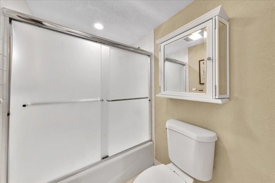 Spacious and updated 3BR/2.5BA *F* model with tile & laminate on  in Florida - for sale on GolfHomes.com, golf home, golf lot