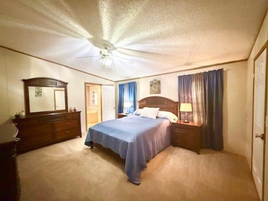 This spacious 4-bedroom, 2.5-bath home sits on a large corner on Pendleton Harbor in Texas - for sale on GolfHomes.com, golf home, golf lot