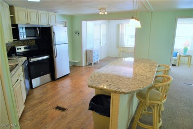 Light, airy, and inviting, this beautifully updated home is on Six Lakes Country Club in Florida - for sale on GolfHomes.com, golf home, golf lot
