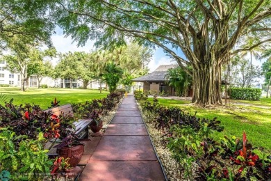 Don't wait a moment longer! Step right into this spacious condo on Pine Island Ridge Country Club in Florida - for sale on GolfHomes.com, golf home, golf lot