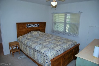 Light, airy, and inviting, this beautifully updated home is on Six Lakes Country Club in Florida - for sale on GolfHomes.com, golf home, golf lot