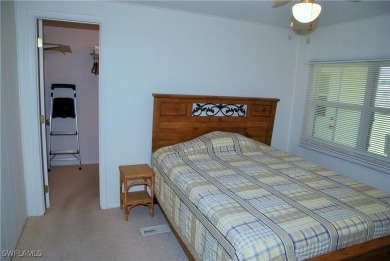 Light, airy, and inviting, this beautifully updated home is on Six Lakes Country Club in Florida - for sale on GolfHomes.com, golf home, golf lot