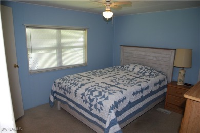 Light, airy, and inviting, this beautifully updated home is on Six Lakes Country Club in Florida - for sale on GolfHomes.com, golf home, golf lot