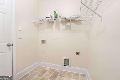 PRICED BELOW APPRAISAL with exceptional seller incentives! This on Canongate At Heron Bay in Georgia - for sale on GolfHomes.com, golf home, golf lot