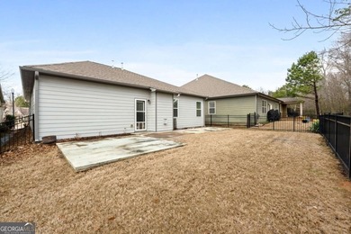 PRICED BELOW APPRAISAL with exceptional seller incentives! This on Canongate At Heron Bay in Georgia - for sale on GolfHomes.com, golf home, golf lot