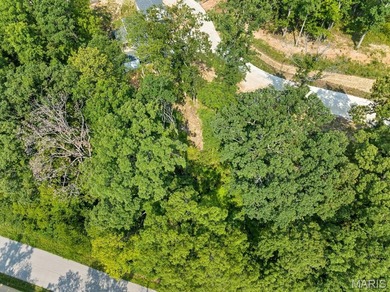 An exceptional opportunity to build a custom luxury residence on on Missouri Bluffs Golf Club in Missouri - for sale on GolfHomes.com, golf home, golf lot