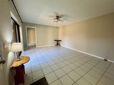 2 Bedroom 2.5 Baths plus additional Room (can be a 3rd Bedroom on Pine Island Ridge Country Club in Florida - for sale on GolfHomes.com, golf home, golf lot