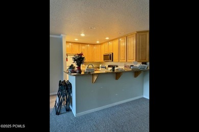 Grindelwald condo in the heart of Midway! Deck overlooks on Homestead Golf Club and Resort in Utah - for sale on GolfHomes.com, golf home, golf lot