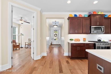 Discover this beautiful, low-maintenance patio home by Hagood on Compass Pointe Golf Course in North Carolina - for sale on GolfHomes.com, golf home, golf lot