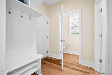 Discover this beautiful, low-maintenance patio home by Hagood on Compass Pointe Golf Course in North Carolina - for sale on GolfHomes.com, golf home, golf lot