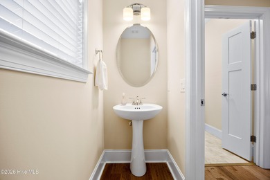 Discover this beautiful, low-maintenance patio home by Hagood on Compass Pointe Golf Course in North Carolina - for sale on GolfHomes.com, golf home, golf lot