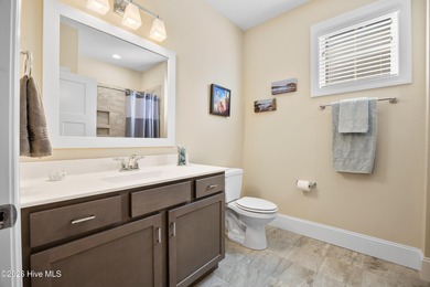 Discover this beautiful, low-maintenance patio home by Hagood on Compass Pointe Golf Course in North Carolina - for sale on GolfHomes.com, golf home, golf lot