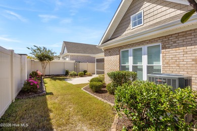 Discover this beautiful, low-maintenance patio home by Hagood on Compass Pointe Golf Course in North Carolina - for sale on GolfHomes.com, golf home, golf lot