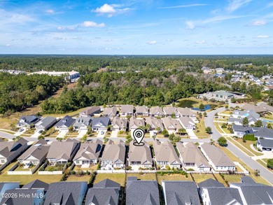Discover this beautiful, low-maintenance patio home by Hagood on Compass Pointe Golf Course in North Carolina - for sale on GolfHomes.com, golf home, golf lot