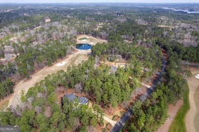 Situated along the highly sought-after Richland golf course at on Reynolds Lake Oconee - The Oconee in Georgia - for sale on GolfHomes.com, golf home, golf lot