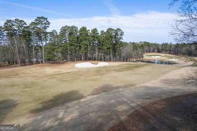Situated along the highly sought-after Richland golf course at on Reynolds Lake Oconee - The Oconee in Georgia - for sale on GolfHomes.com, golf home, golf lot