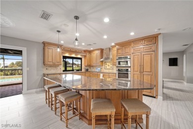 This exceptional 4-bedroom, 3.5-bath home combines luxury and on Eagle Ridge Golf and Tennis Club in Florida - for sale on GolfHomes.com, golf home, golf lot