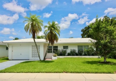 **MAINLANDS OF TAMARAC BY THE GULF SHOWPLACE** Beautifully on Mainlands Golf Club in Florida - for sale on GolfHomes.com, golf home, golf lot