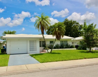 **MAINLANDS OF TAMARAC BY THE GULF SHOWPLACE** Beautifully on Mainlands Golf Club in Florida - for sale on GolfHomes.com, golf home, golf lot