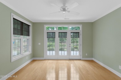 Nestled in a quiet cul-de-sac and backed by a serene pond shaded on Members Club At St. James Plantation in North Carolina - for sale on GolfHomes.com, golf home, golf lot