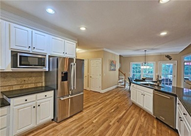 Stunning 3 Sided Brick Home in Foxhall, Exclusive Golf, Swim and on Ansley Golf Club At Settindown Creek in Georgia - for sale on GolfHomes.com, golf home, golf lot