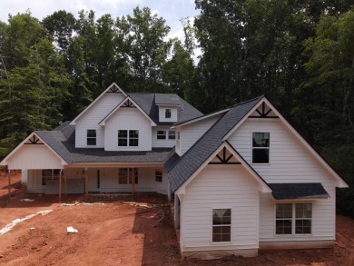 Welcome to 1444 Red Cedar, a luxury retreat nestled within the on Double Oaks Golf Club in Georgia - for sale on GolfHomes.com, golf home, golf lot
