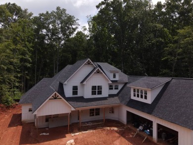 Welcome to 1444 Red Cedar, a luxury retreat nestled within the on Double Oaks Golf Club in Georgia - for sale on GolfHomes.com, golf home, golf lot